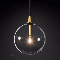 Transparent glass pendant light with modern and vintage bubbles