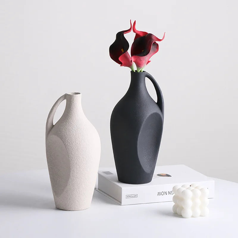 Sculptural black and white ceramic vases