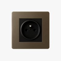 Electric socket in aged bronze steel rounded edges