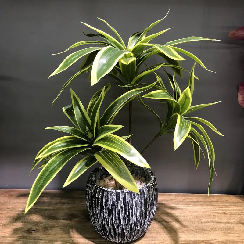 Artificial tropical plant with three heads in decorative pot