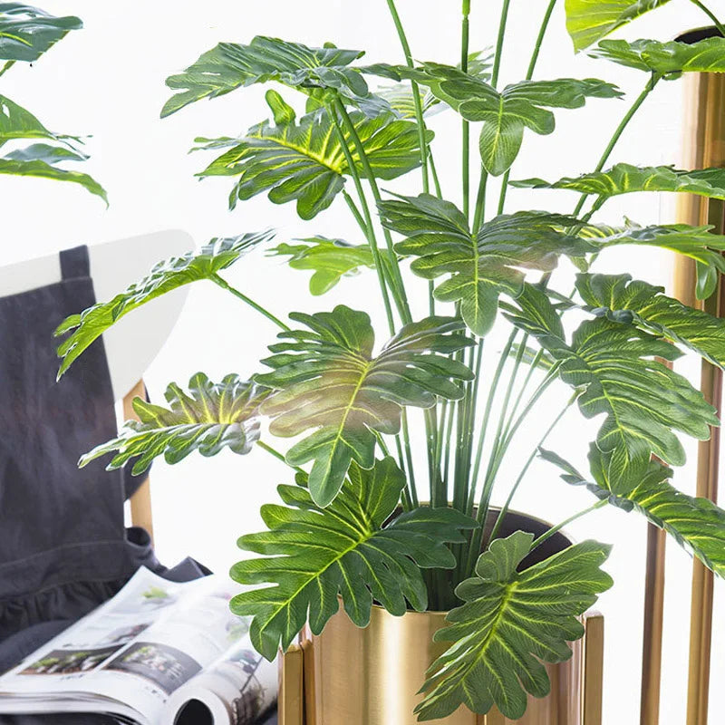 Artificial monstera plants for tropical and festive decoration