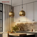 Metal and brass pendant light for industrial interior lighting