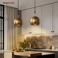 Metal and brass pendant light for industrial interior lighting