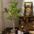 Large artificial palm tree tropical plant in decorative pot