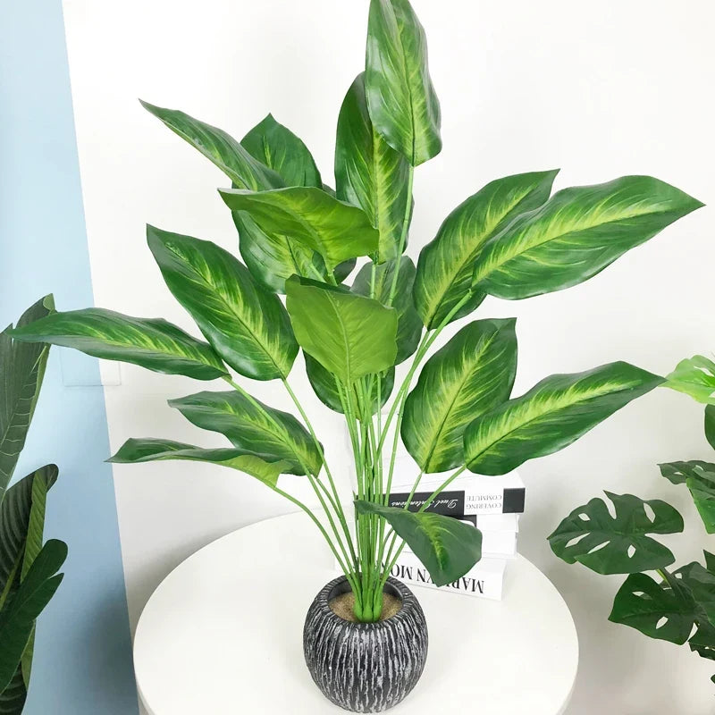 Artificial plants strelitzia and monstera for tropical decoration