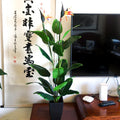 Artificial palm with pot and large leaves for interior and exterior decoration