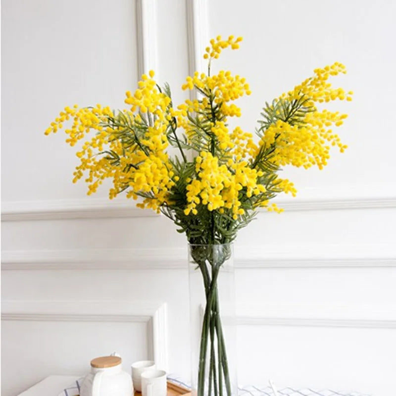 Artificial mimosa branch with tropical palm leaves