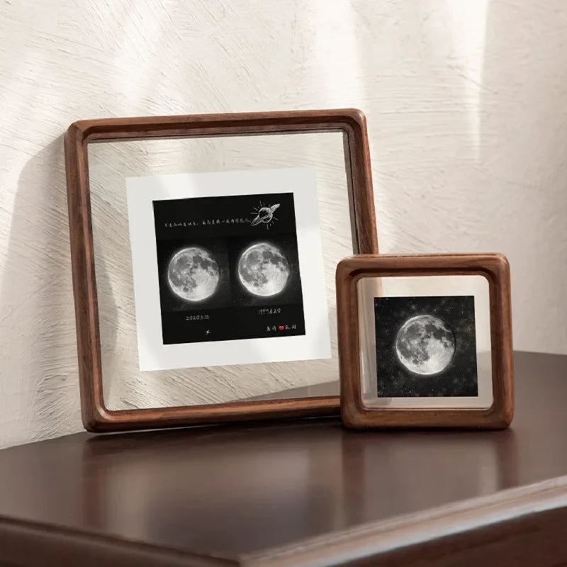 Double-sided photo frame in wood and glass for interior decoration