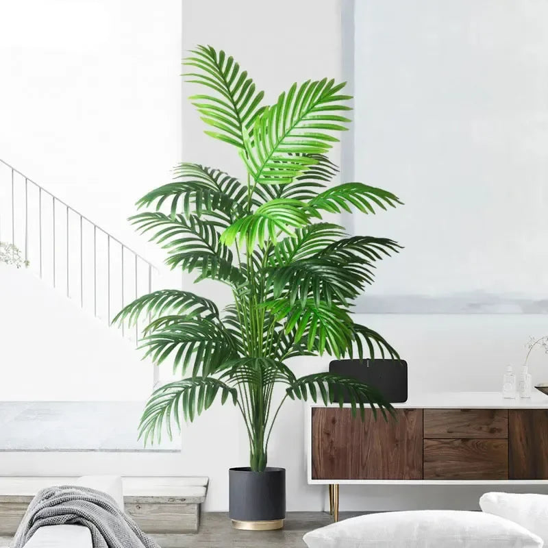 Tropical artificial plants palm and monstera interior and exterior decoration