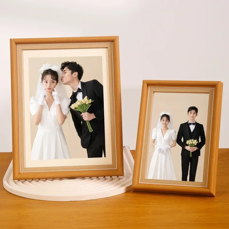 Wooden picture frame for family portraits and travels
