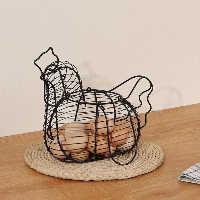 Forged iron storage basket in the shape of chicken for eggs and fruit