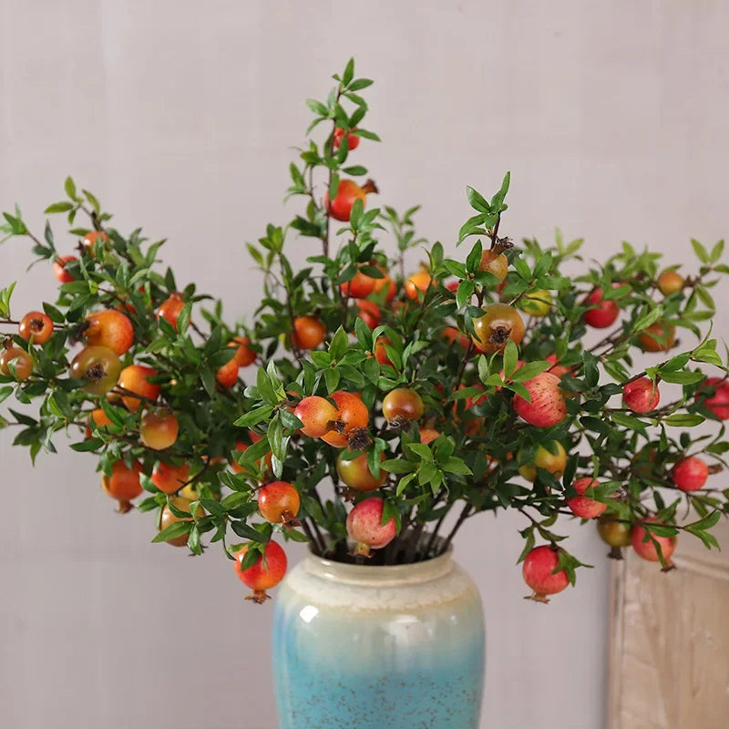 Garden decoration with artificial grenades and green plants - view 4