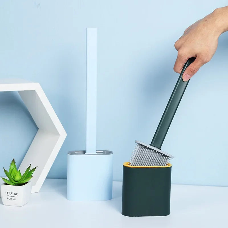 Wall toilet brush without perforation with drainable base