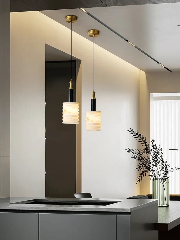 Modern pendant light in natural stone for minimalist lighting