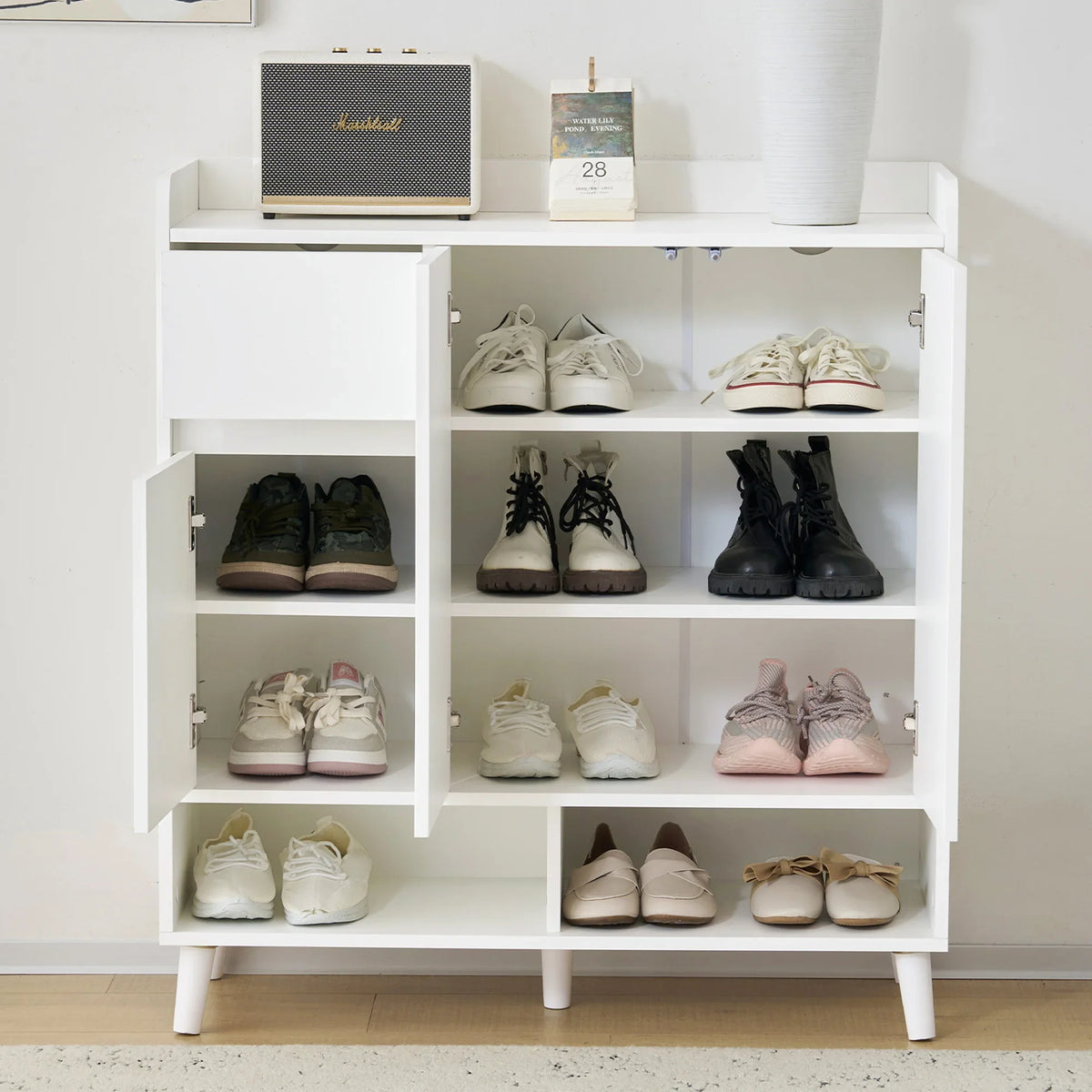 Minimalist storage cabinet with adjustable shelves and wooden feet - N657P19981617W