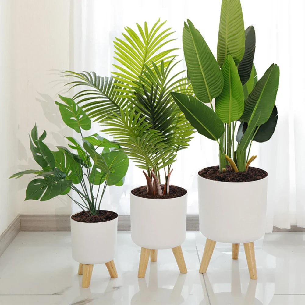Round standing flower pot with automatic watering and drainage