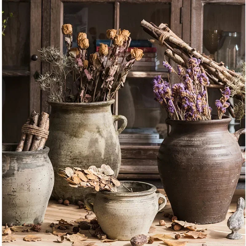 Rustic pottery gardeners for interior and exterior decoration