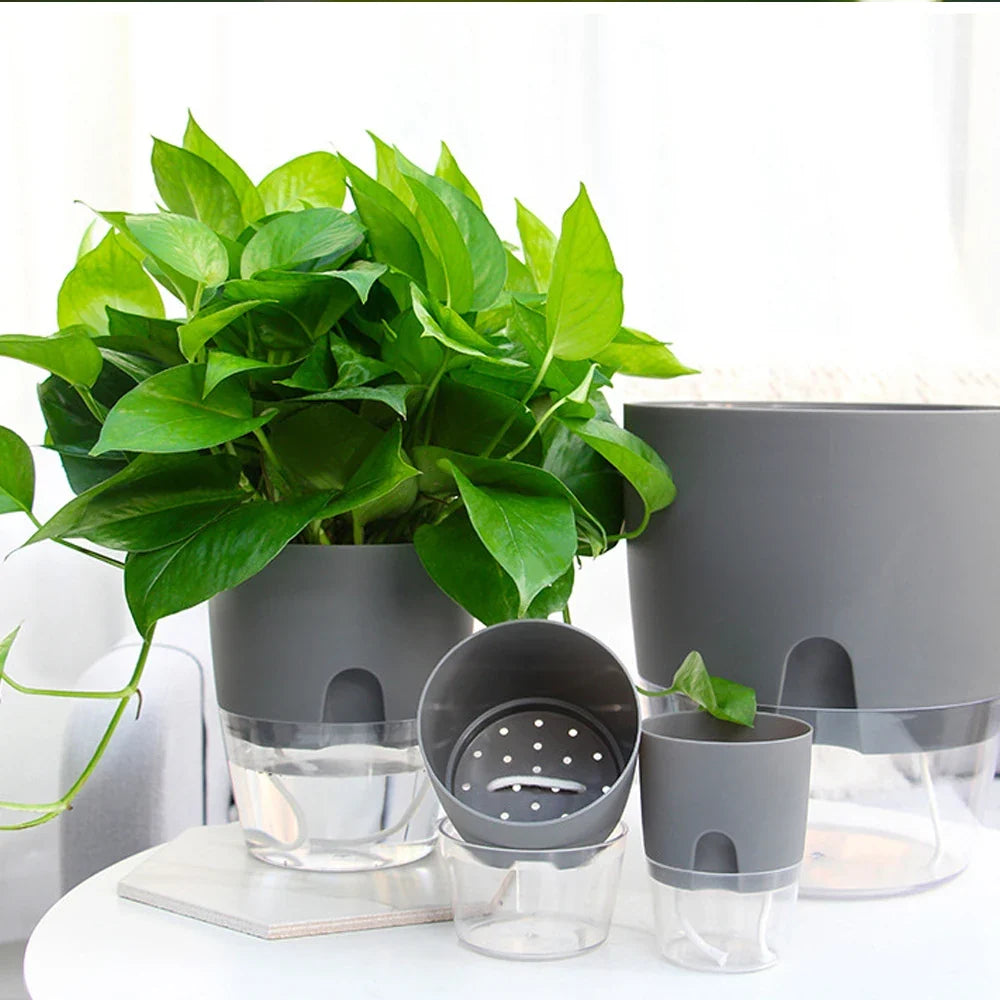 Plastic flower pot with automatic watering and absorbent rope - view 2