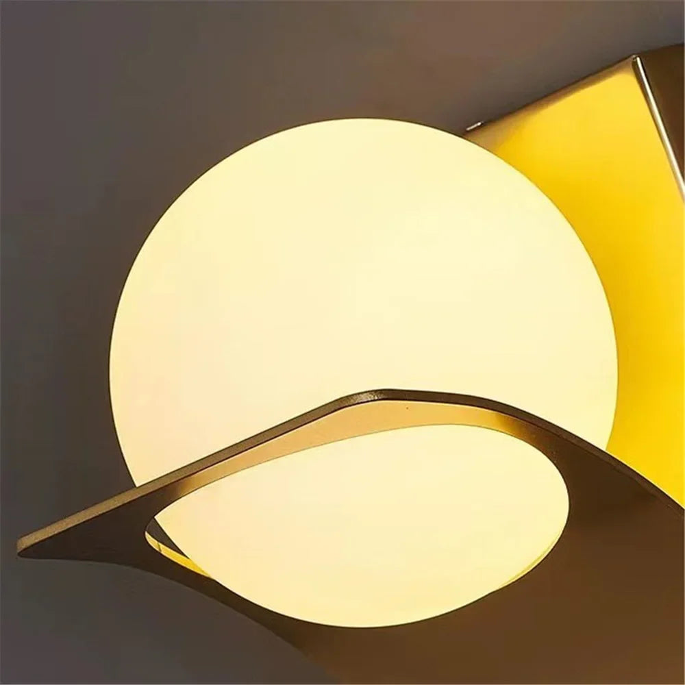 Wall sconce in gold metal with elegant design glass ball - view 4