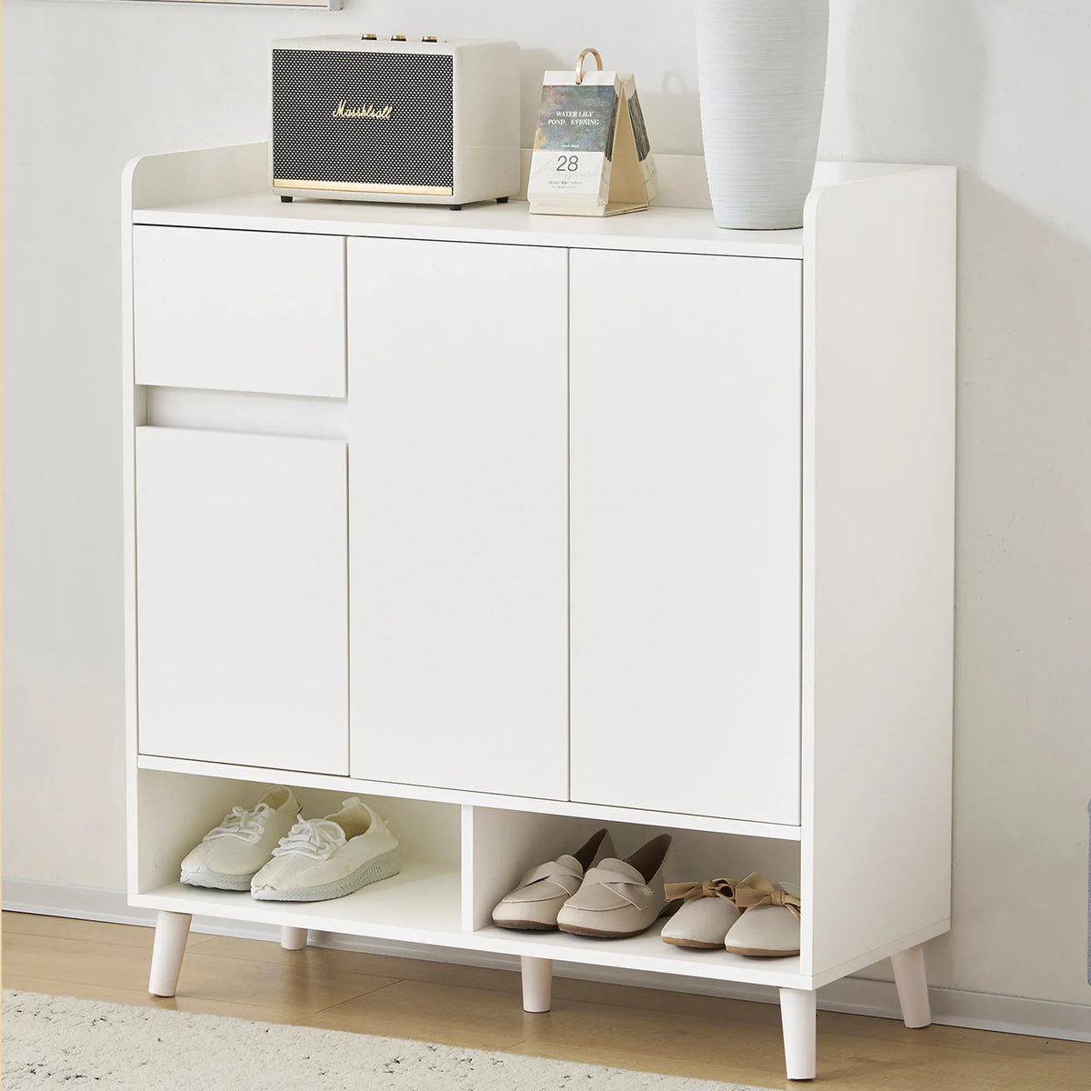 Minimalist storage cabinet with adjustable shelves and wooden feet - view 5