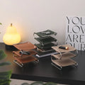 Multifunction storage holder in leather and stainless steel