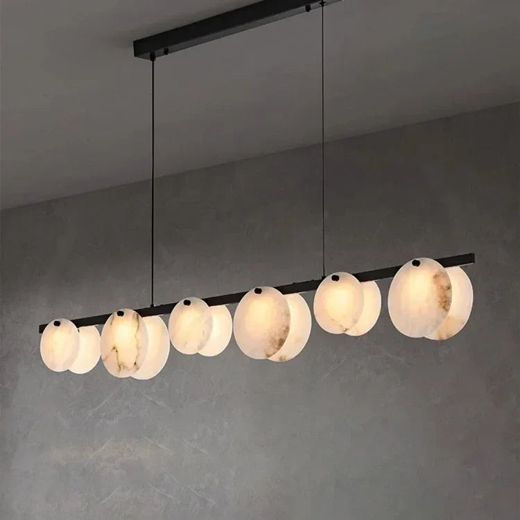 Modern pendant light in marble and copper for interior decoration