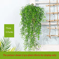 Wall decoration in rattan with leaves and golden bell - Green