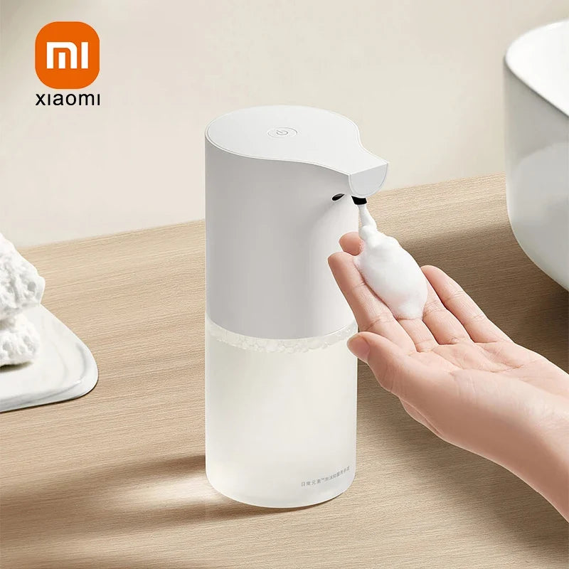 Automatic refillable foam dispenser for kitchen and bathroom