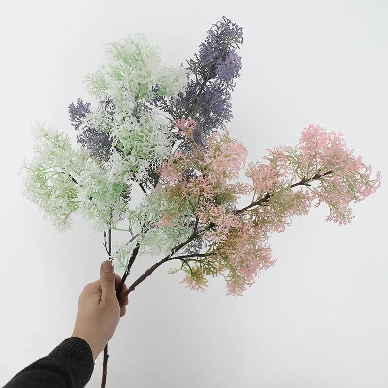 Decorative plant made of artificial grass for indoor use