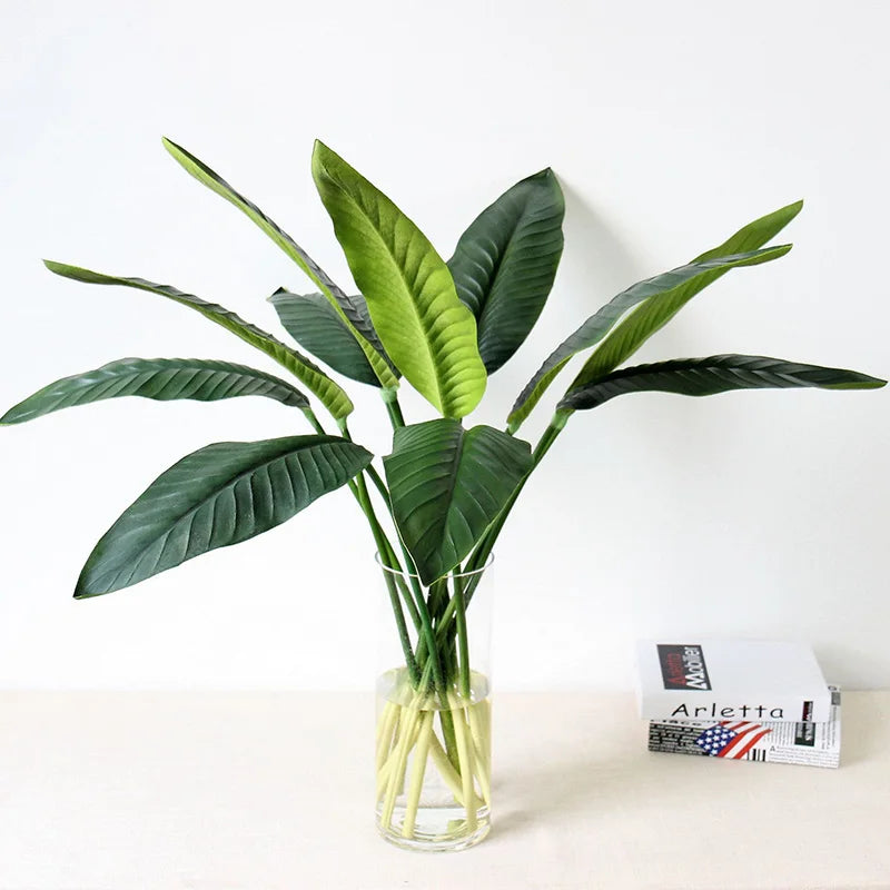 Tropical floral arrangement with birds and decorative bananas wedding