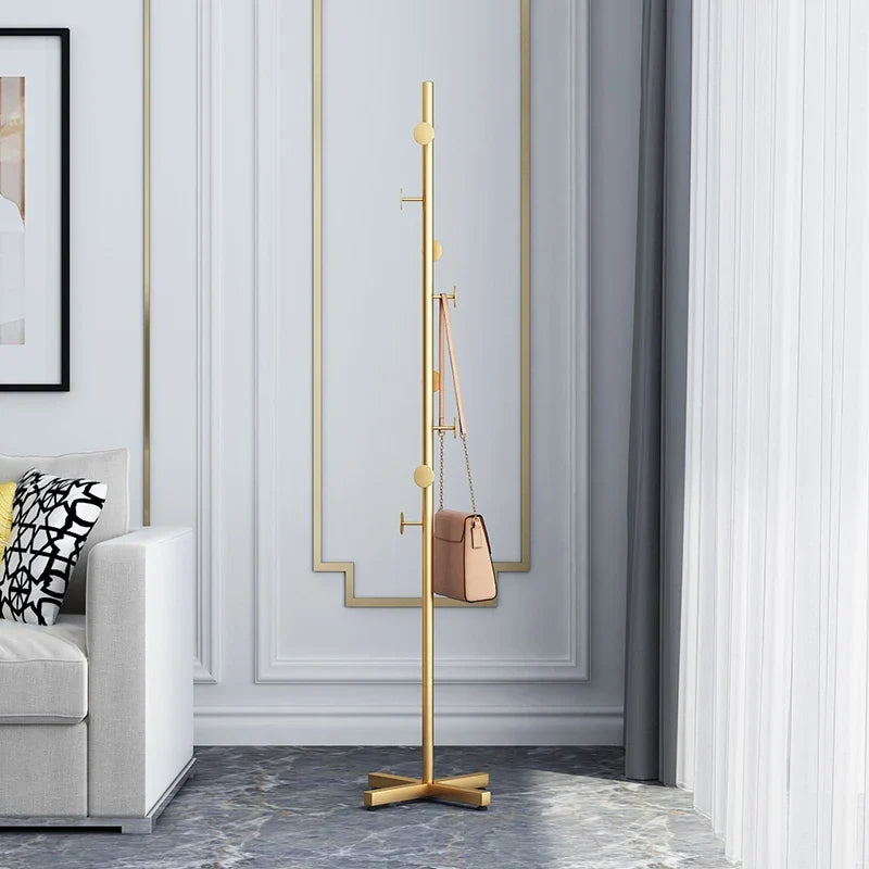 Modern hanger on foot design for stylish interior clothing - Gold