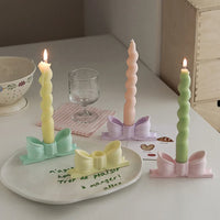 Korean vintage candlestick in the shape of a creative decorative knot