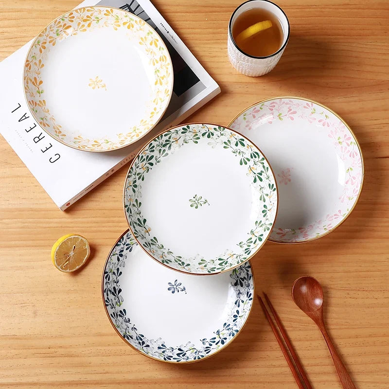 Lot 4 ceramic plates floral motifs 20 cm