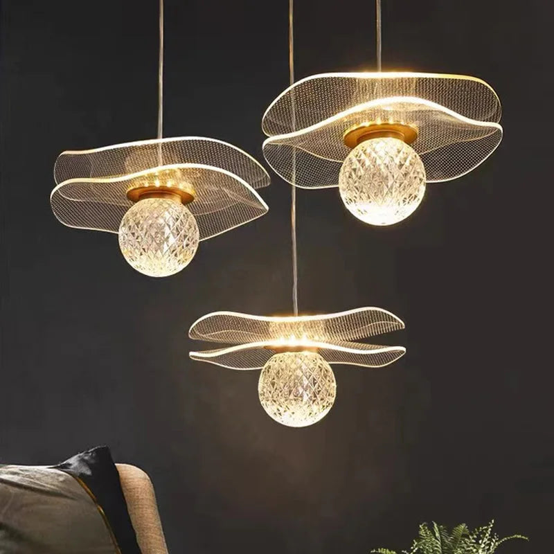 Modern pendant light in the shape of a customizable crystal lotus sheet