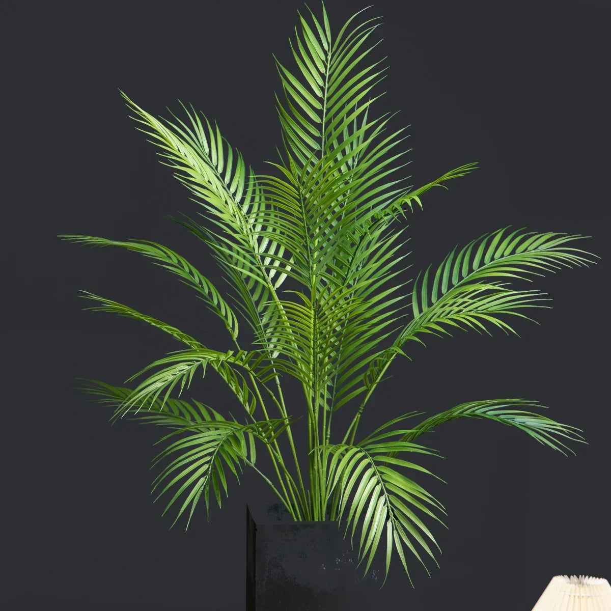 Large artificial palm with monstera leaves for outdoor decoration