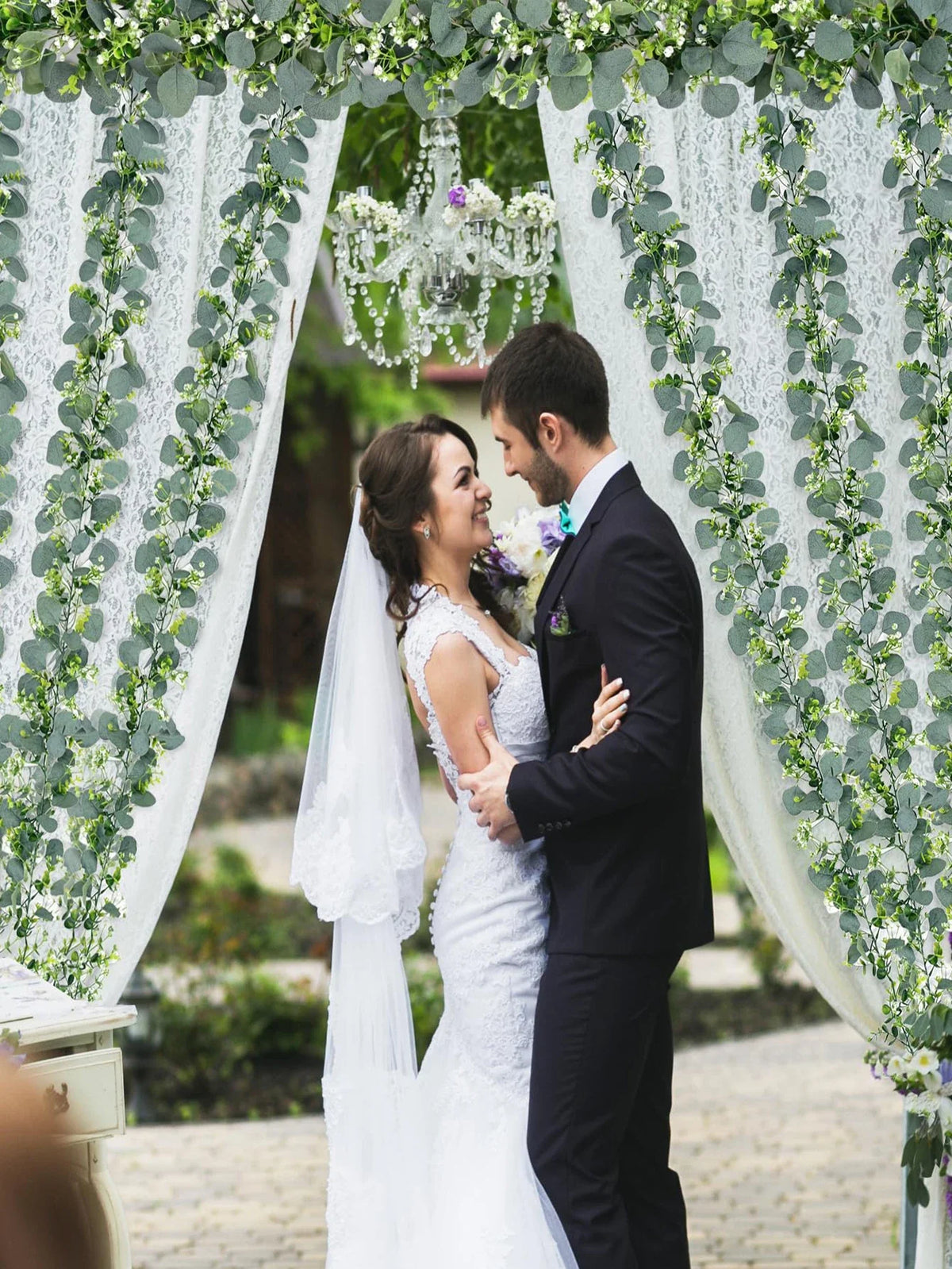 Artificial eucalyptus garland with white flowers and decorative berries - view 6