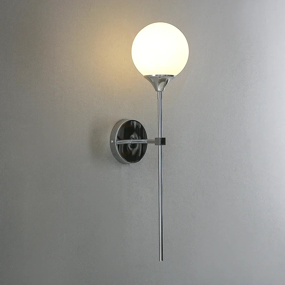 Modern wall sconce in glass and chrome gold for interior decoration