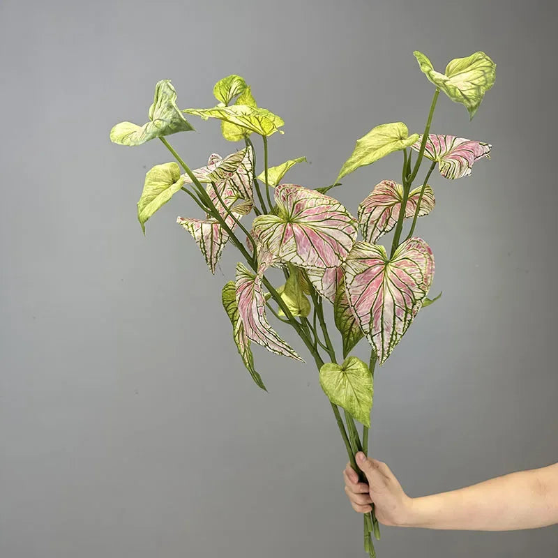 Artificial palm leaves for interior floral decoration
