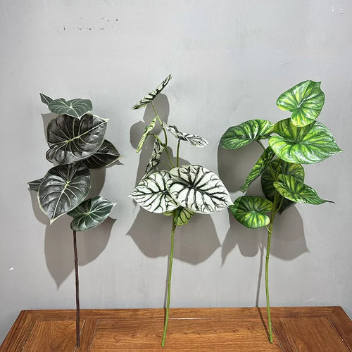 2 artificial green plastic decorative plants
