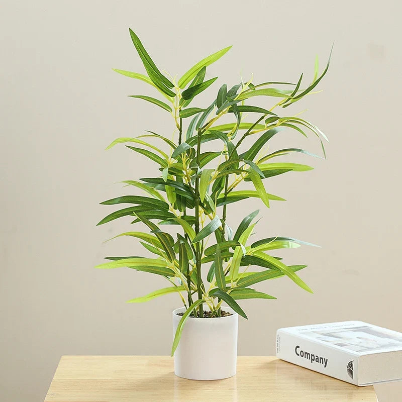 Artificial plant in bamboo pot monstera for office and home decor