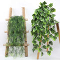 Plant suspended in vine band artificial wall decoration