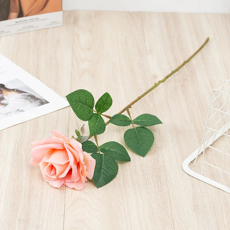 Realistic artificial rose branch for decoration and photography