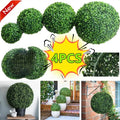 Lot of artificial topiary balls for garden and wedding decoration