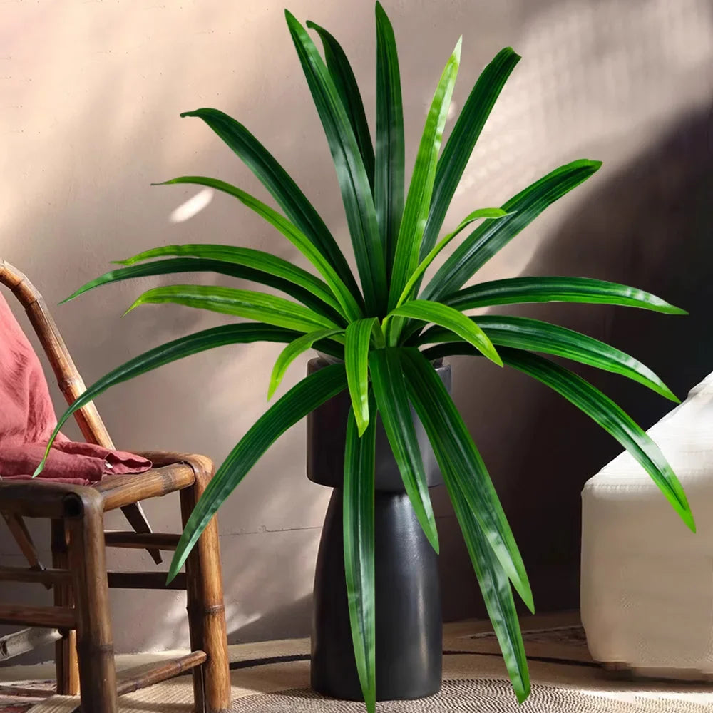 Artificial magnolia plants and tropical leaves for decoration