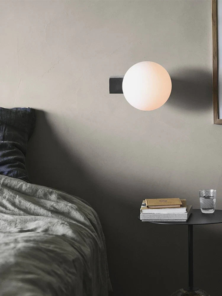 Creative wall sconce in stainless steel for modern interior
