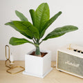 Tropical artificial palm in pot for interior and exterior decoration