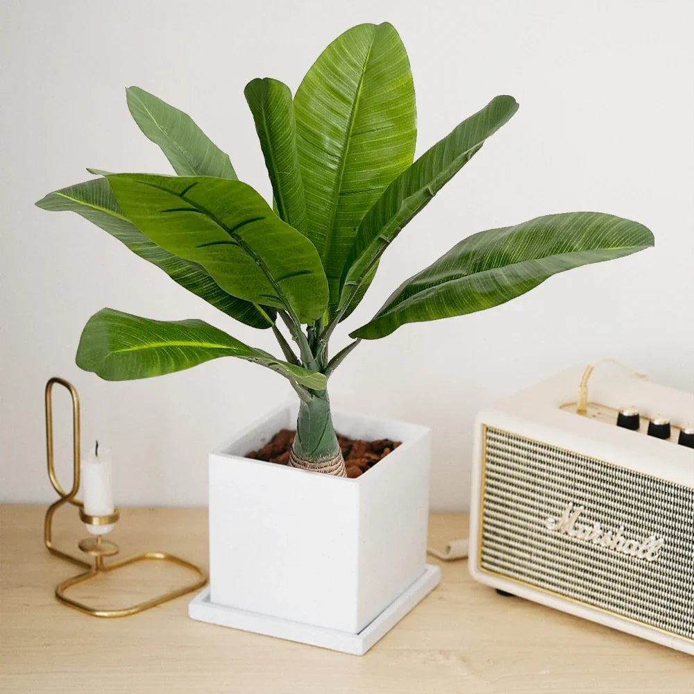 Tropical artificial palm in pot for interior and exterior decoration