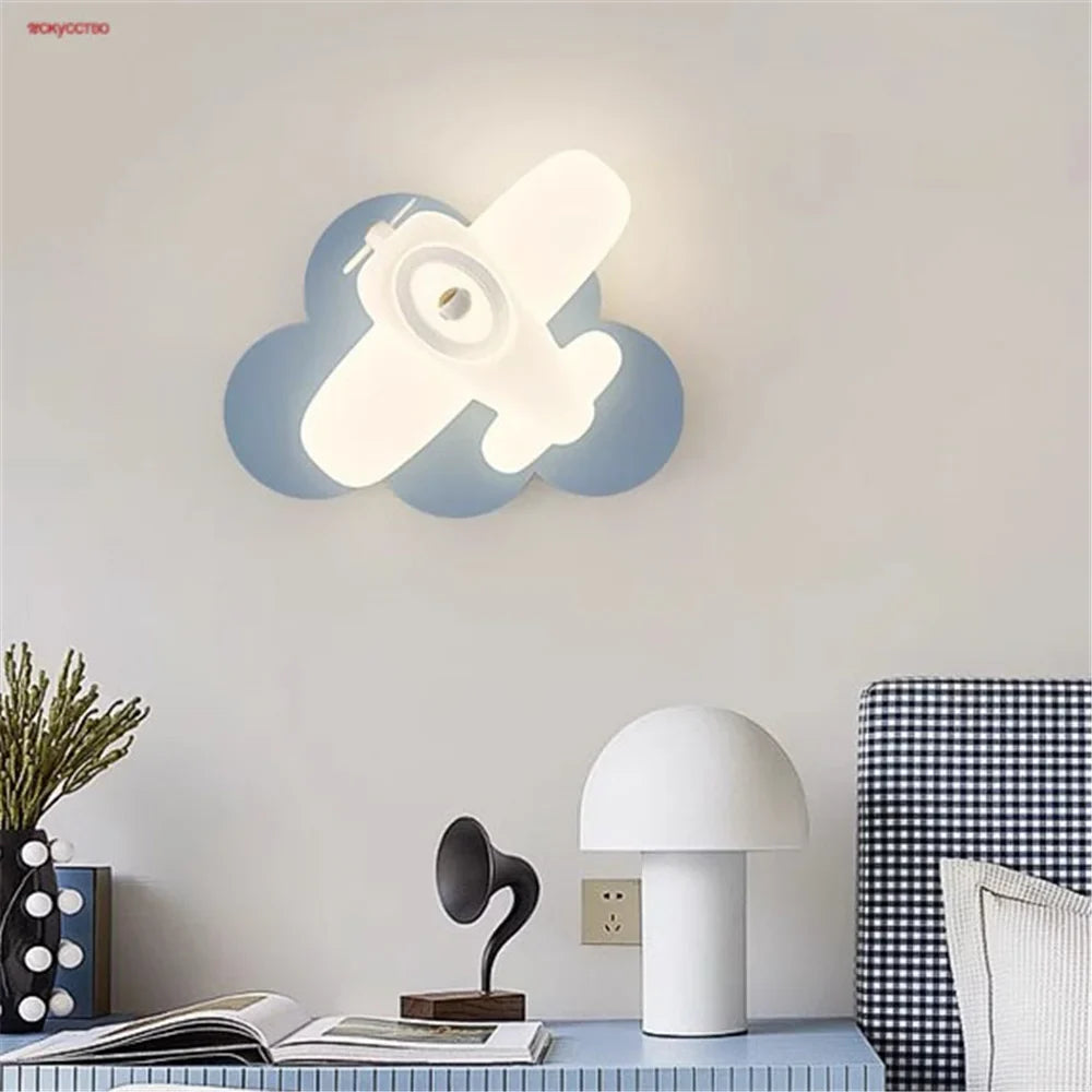 Led wall sconce in the shape of an airplane or a children's star