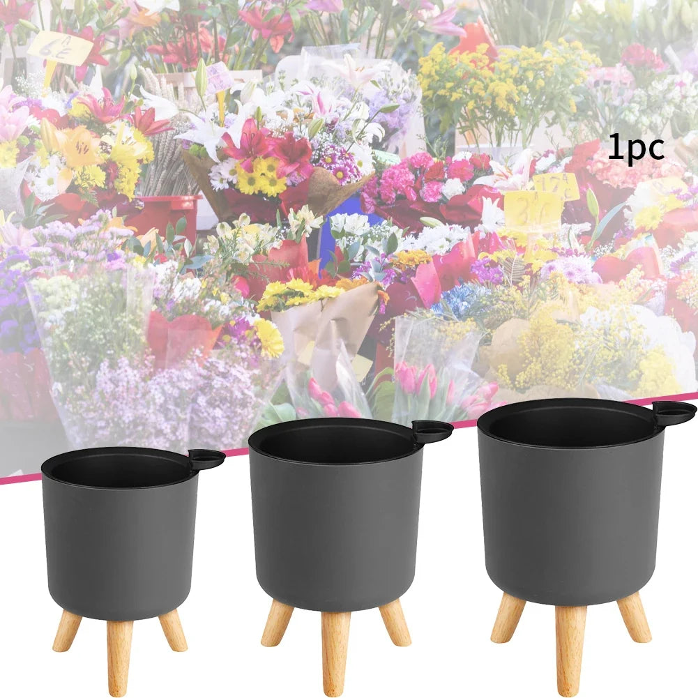 Round standing flower pot with automatic watering and drainage - view 2