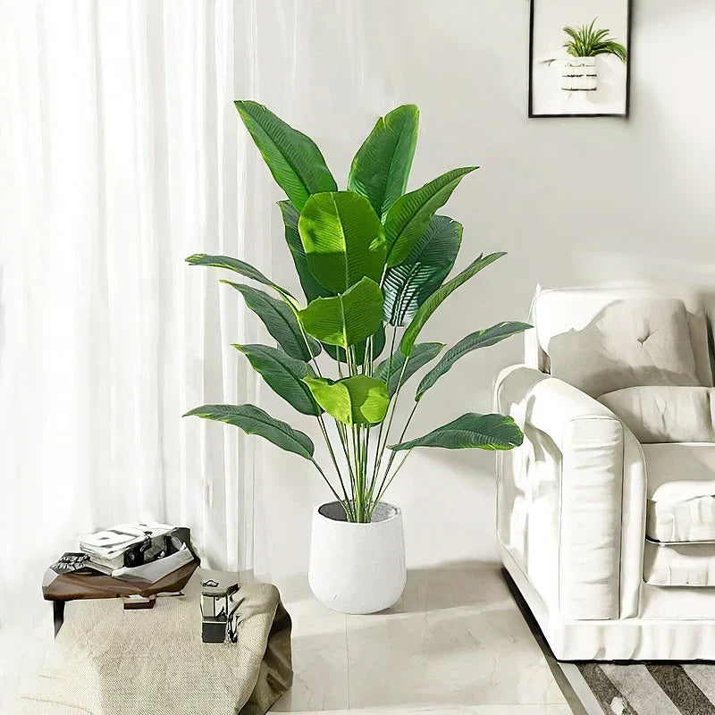 Artificial banana plants and tropical palms for festive decoration